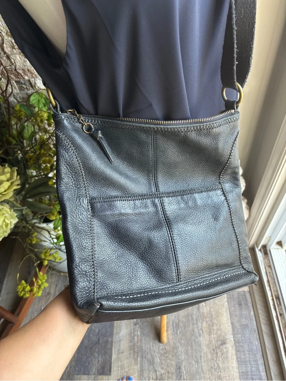 The Sak Black Leather Pebbled Crossbody with Gold Accents